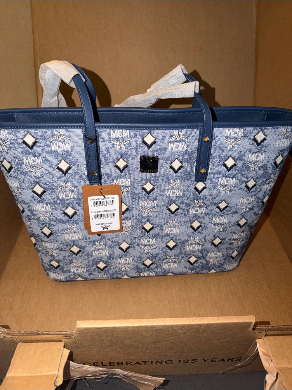 Authentic!!!! MCM Blue Monogram Canvas Tote with Leather Trim.
